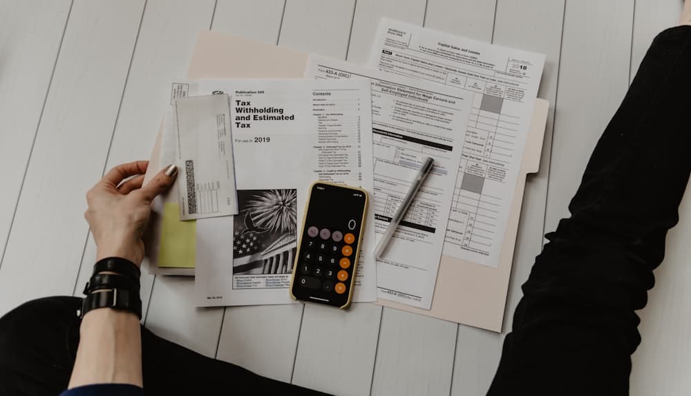 Financial documents and calculations for a case file